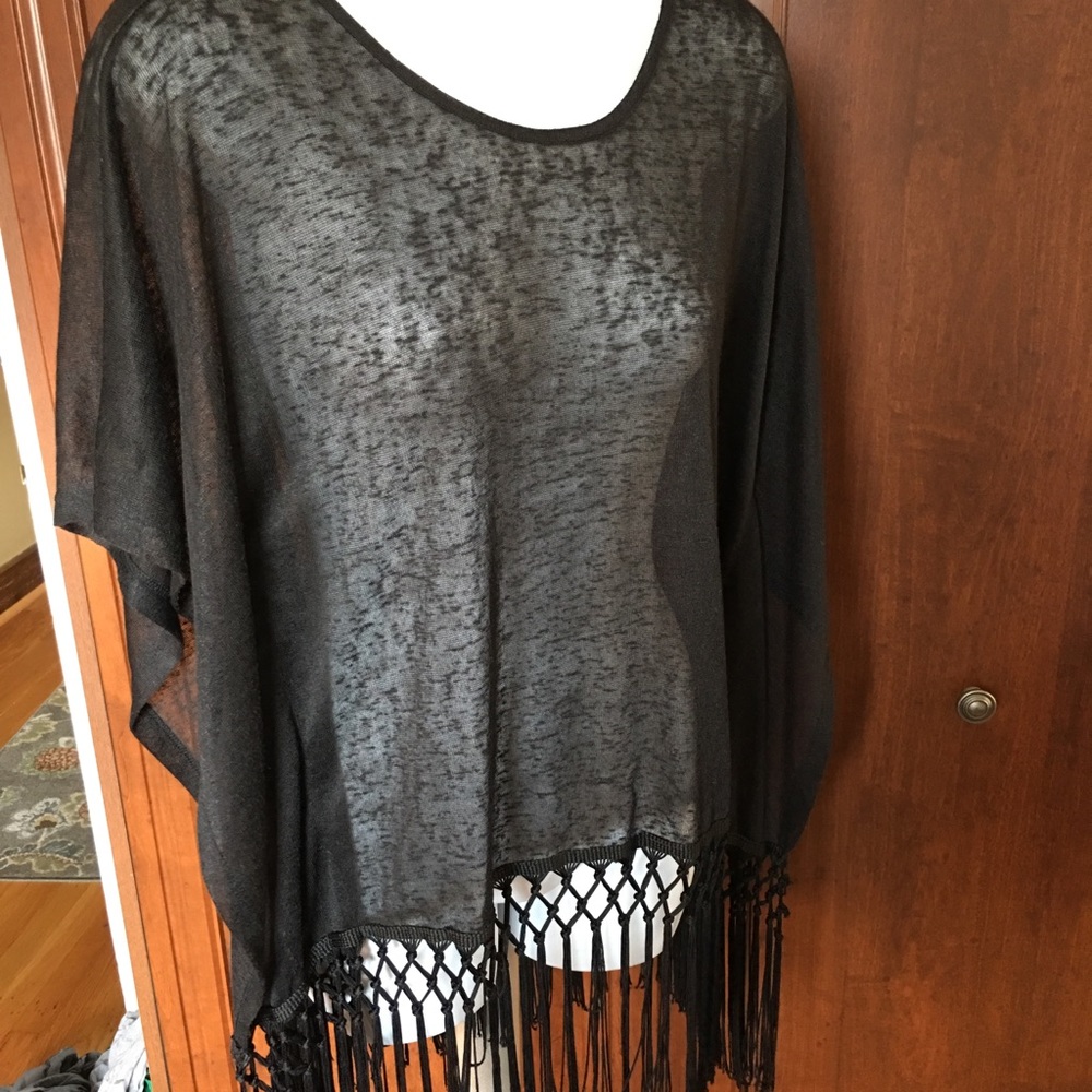 Black sheer fringed top.